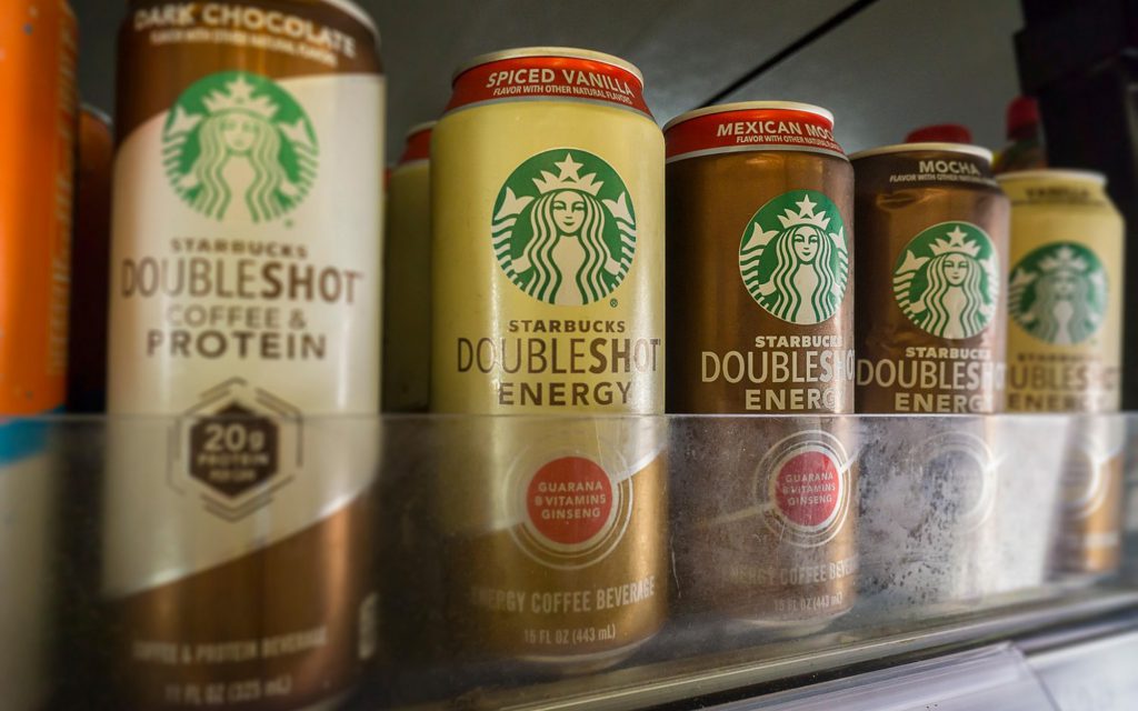 Cans of Starbucks coffee in a convenience store in New York.